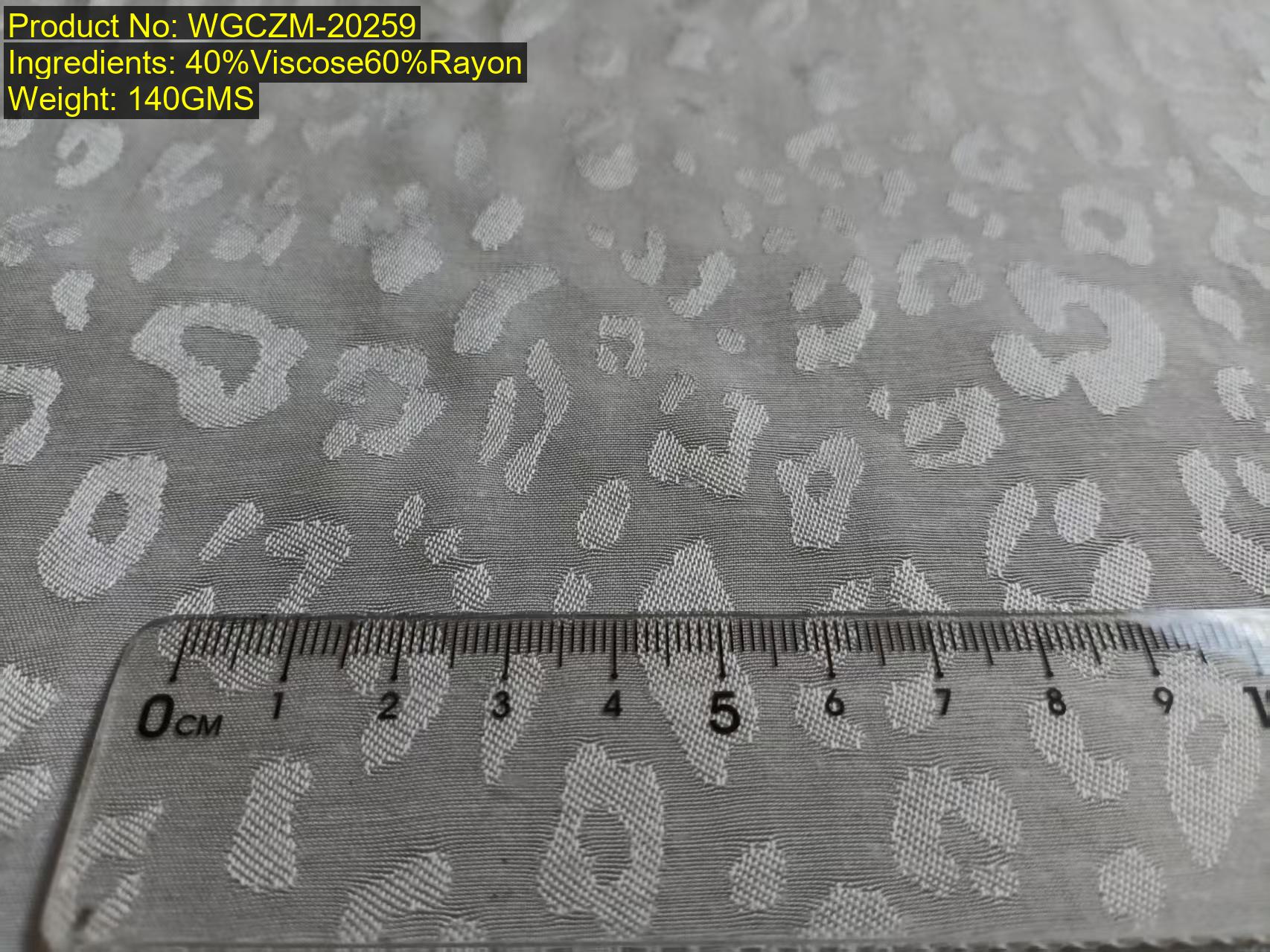 Fabric photo with ruler - WGCZM-20259 - woven big jacquard leopard effect - viscose plus rayon - used for price calculator validation